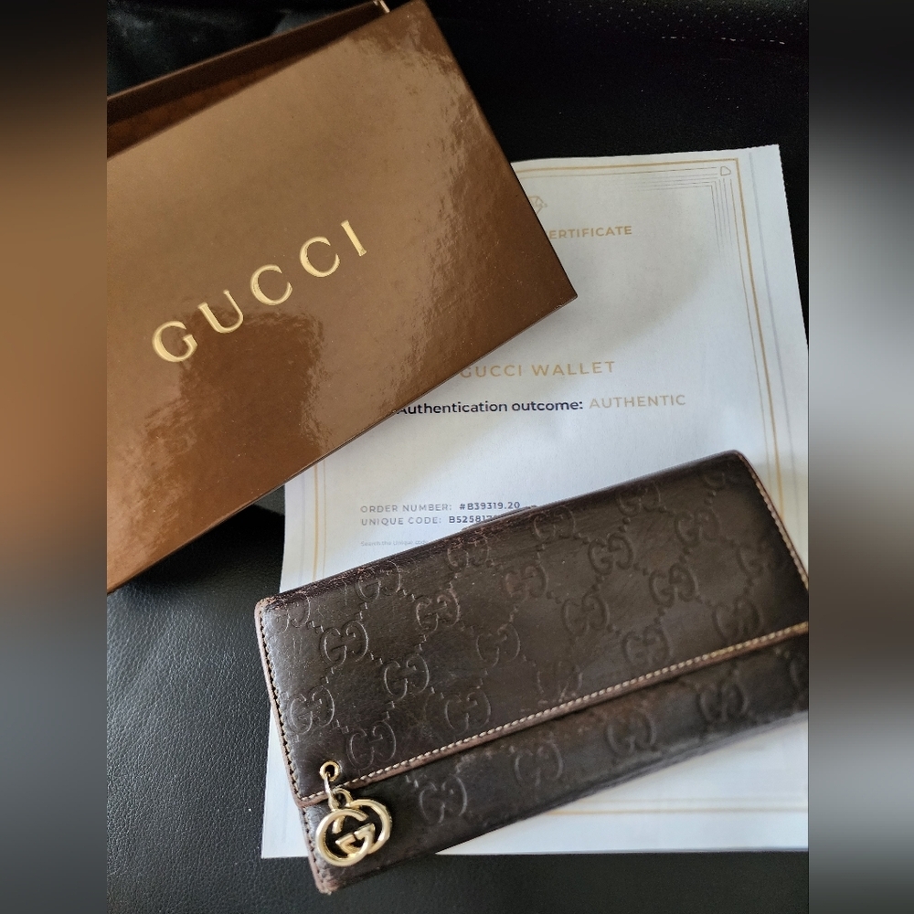 Preowned Gucci brown leather monogrammed wallet Authenticated